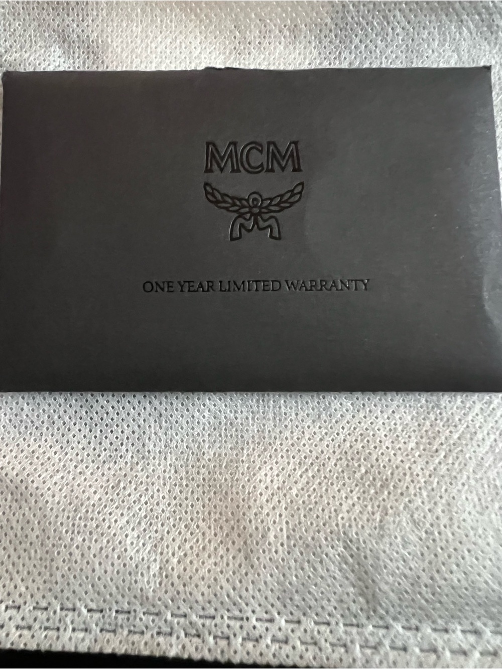 MCM Black Embossed Warranty Envelope